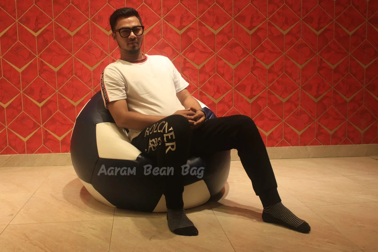 Relaxing on XXL Football Shape Bean Bag – Lifestyle Image