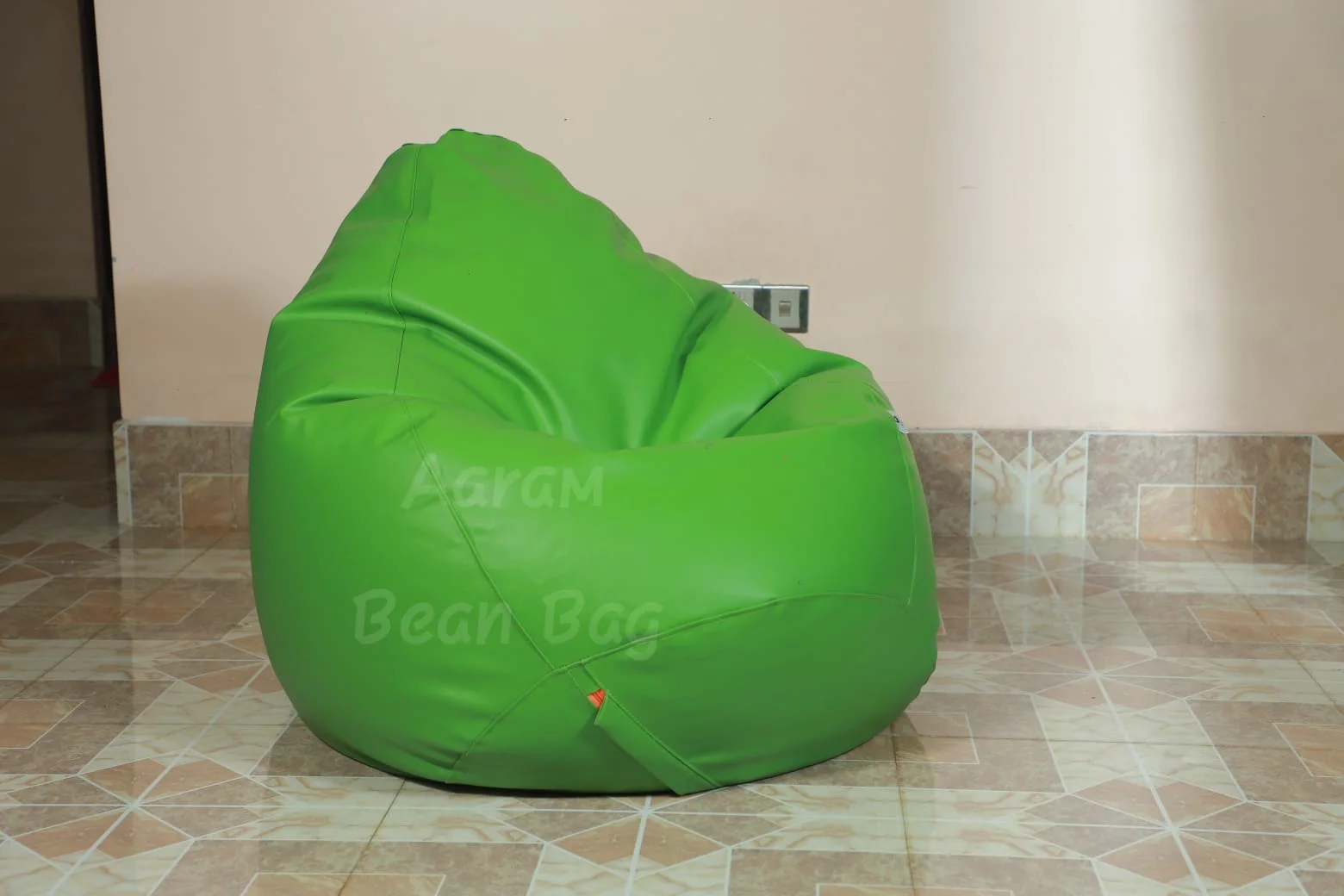 Relaxing on XXXL Red Faux Leather Bean Bag – Lifestyle Image
